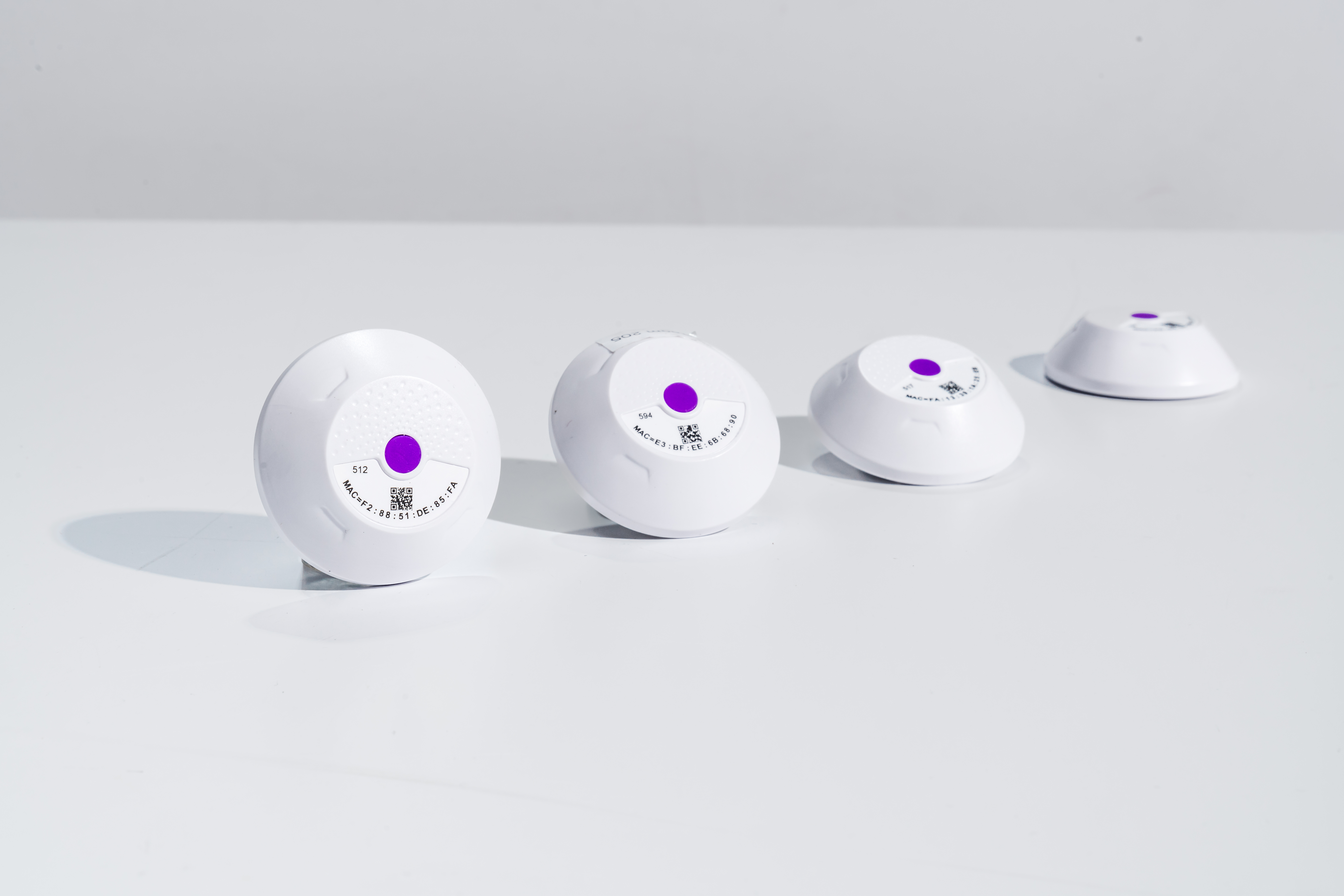 Beacon BLE room sensors shown in clean product photography